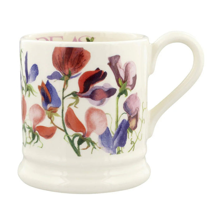 White mug with floral design on a white background