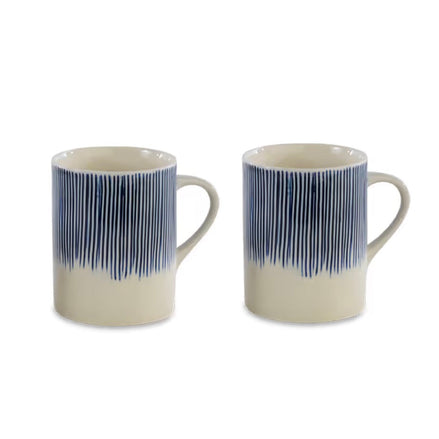 Two ceramic mugs with blue striped design on a white background