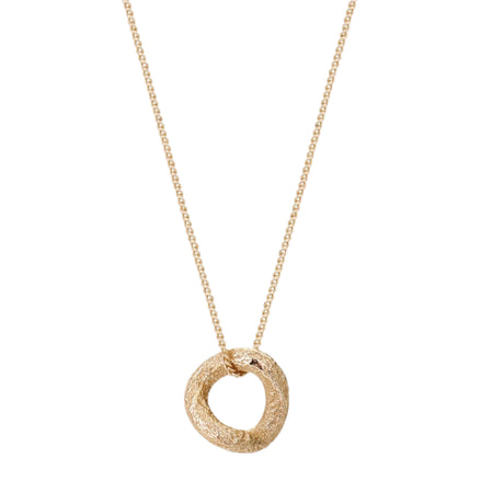 Gold necklace with a textured circular pendant on a white background