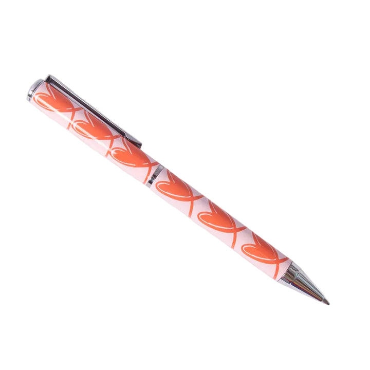 Pen with orange and white design on a white background
