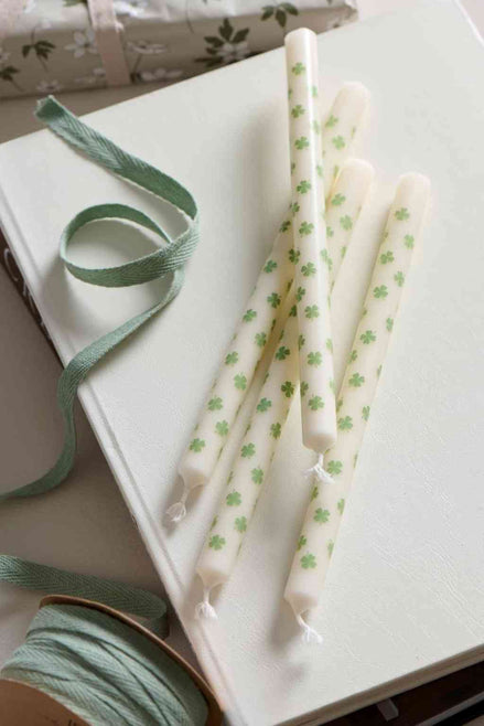 Taper candle with Green clovers